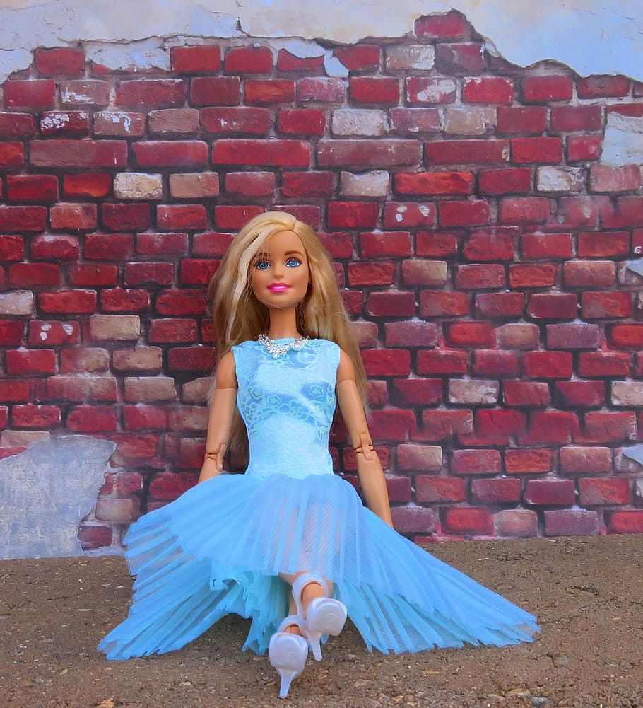 HD wallpaper: Barbie doll, blonde, sitting, brick wall, posing ...