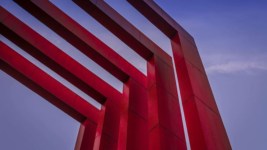 low-angle photography of five red arch gateway, construction