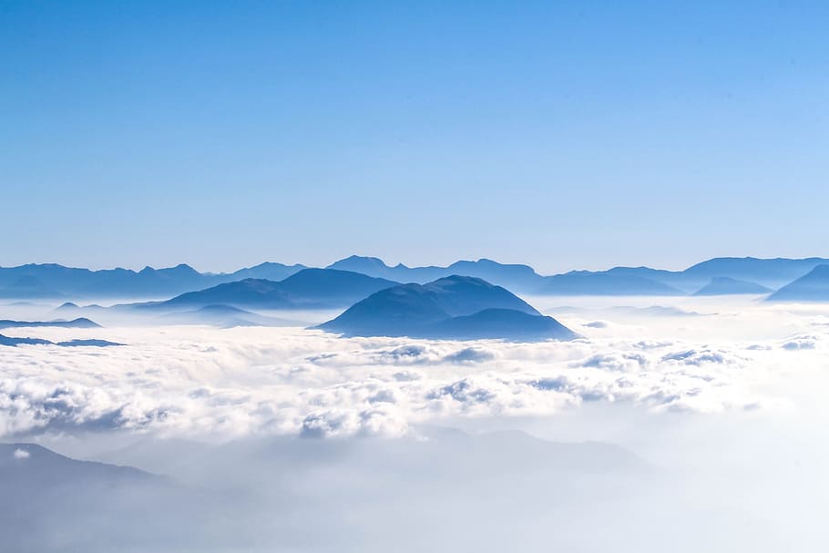 aerial photography of mountains, black mountains on sea of clouds during daytime HD wallpaper