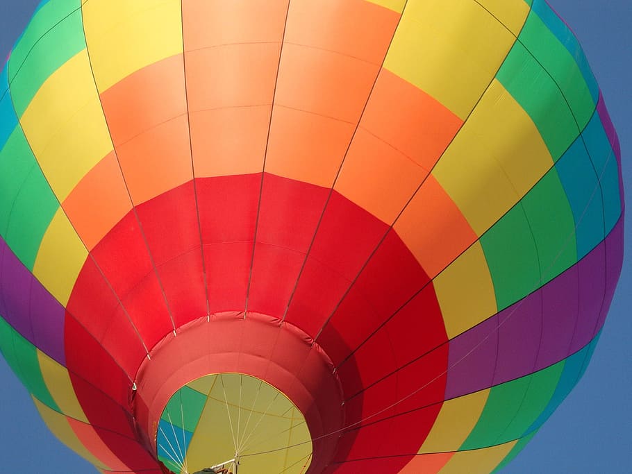 worm's eye view of multicolored hot air balloon, colorful, rise