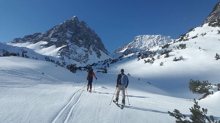 man in black jacket near mountain at daytime, backcountry skiiing, HD wallpaper