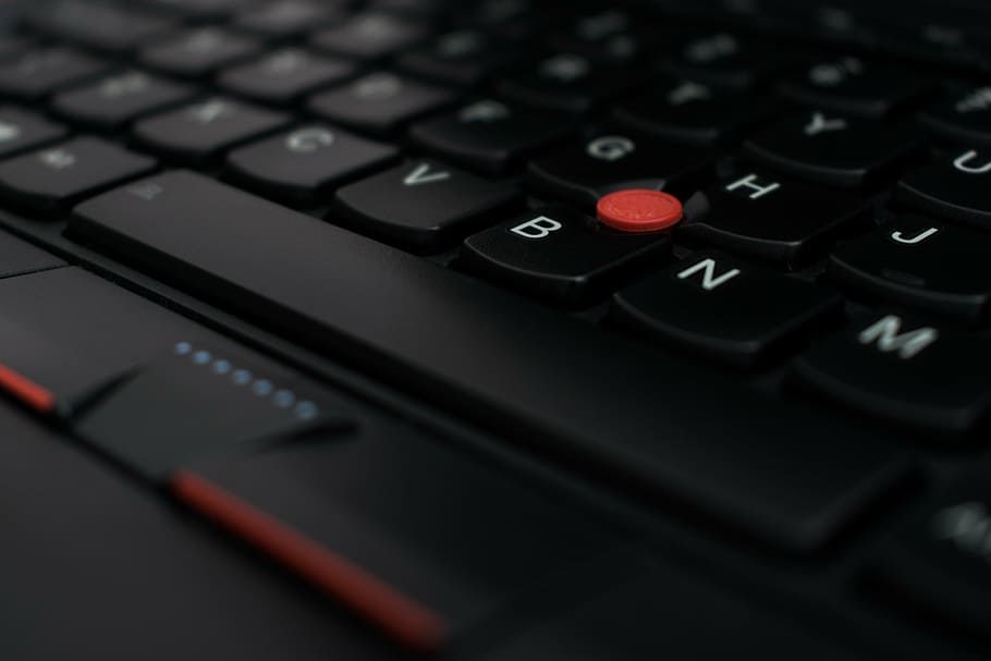 round plastic ornament on black keyboard, laptop, notebook HD wallpaper
