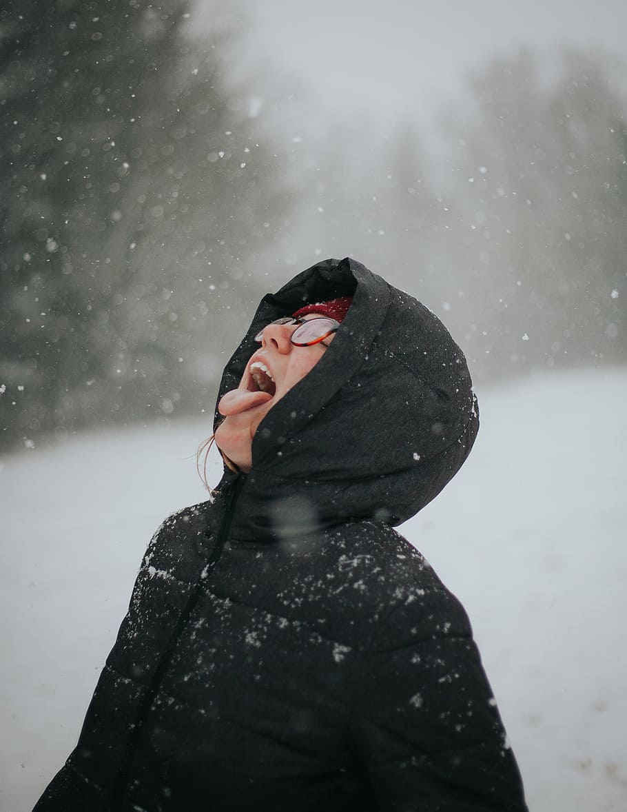 person opening his mouth to taste the snow, person wearing black coat opening mouth facing upward, HD wallpaper