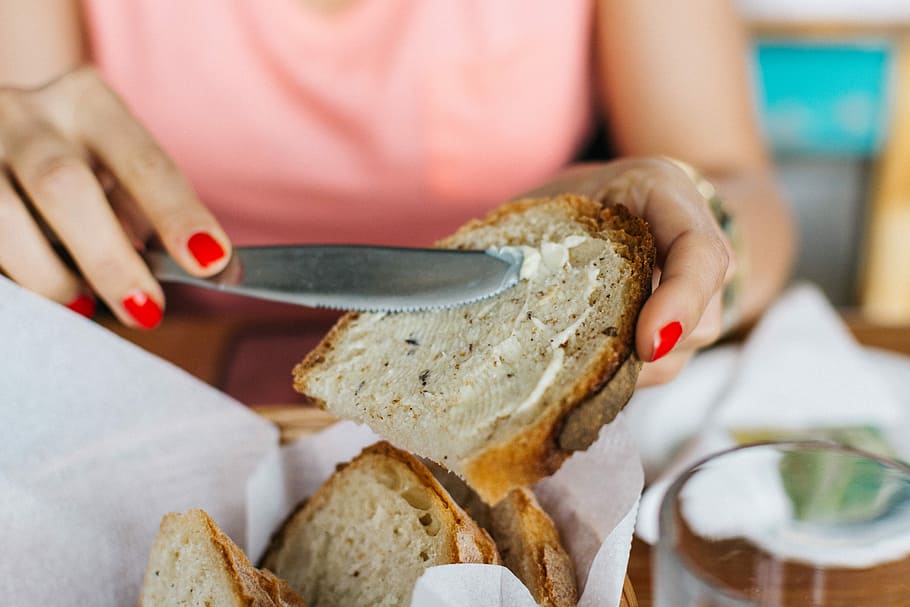 Bread with butter, close up, hands, pastry, process, food, slice HD wallpaper