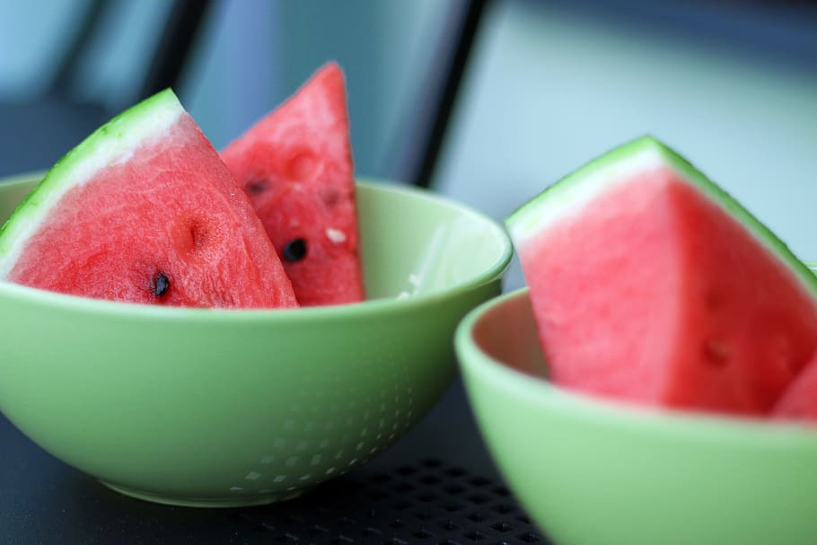two green bowl of sliced water melons, watermellon, watermelon