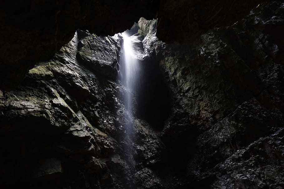 waterfalls in between brown rock, cave, gorge, small waterfall, HD wallpaper