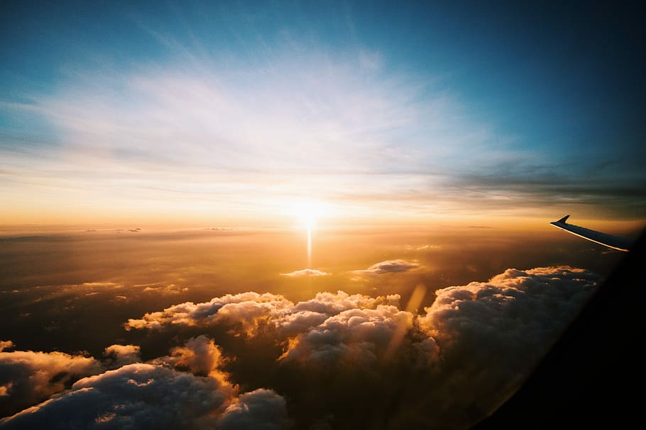 aerial view of sea of clouds during sunset, aerial photo of golden hour HD wallpaper