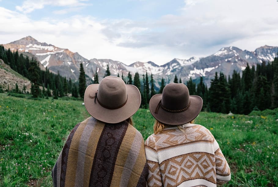 two people looking at the mountains, two person looking on mountains during daytime, HD wallpaper