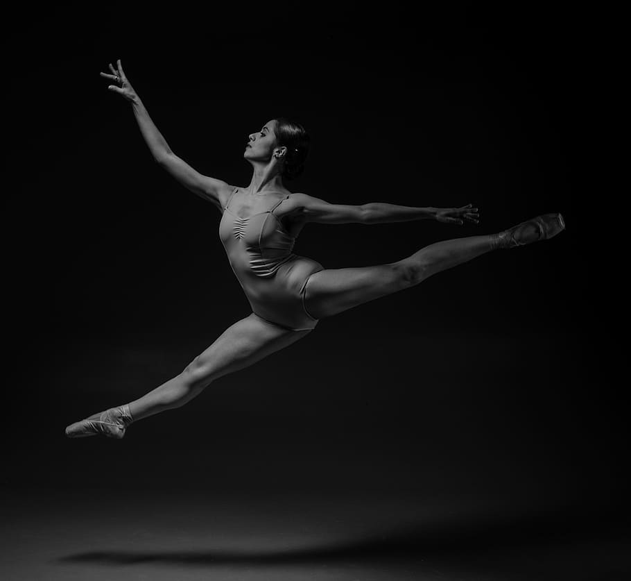 ballerina splitting in the air, people, woman, black and white