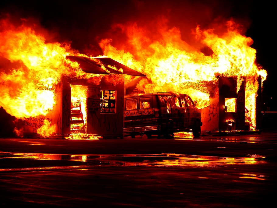 flaming house and vehicle during daytime, building on fire near body of water, HD wallpaper