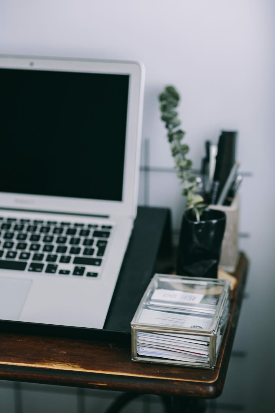 Elegant workspace with Macbook, iPhone, business cards and notebooks HD wallpaper