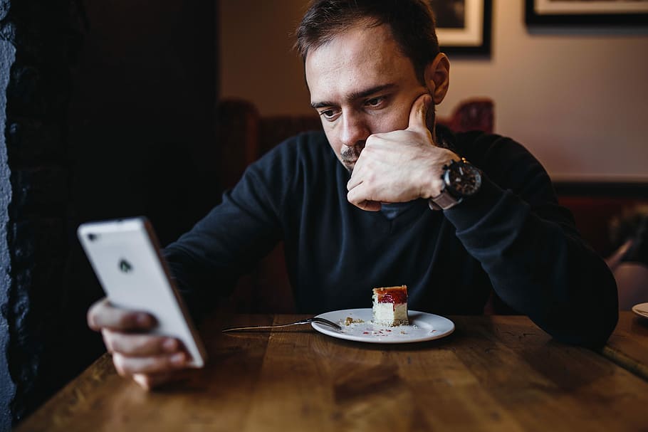 Young Elegantly dressed man sititng in a cafe, caucasian, interior HD wallpaper