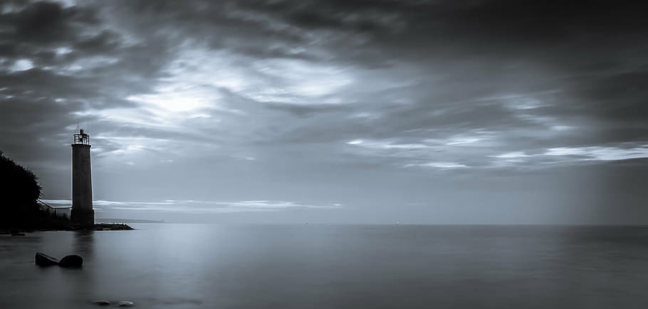 greyscale photography of lighthouse near ocean, sea, water HD wallpaper