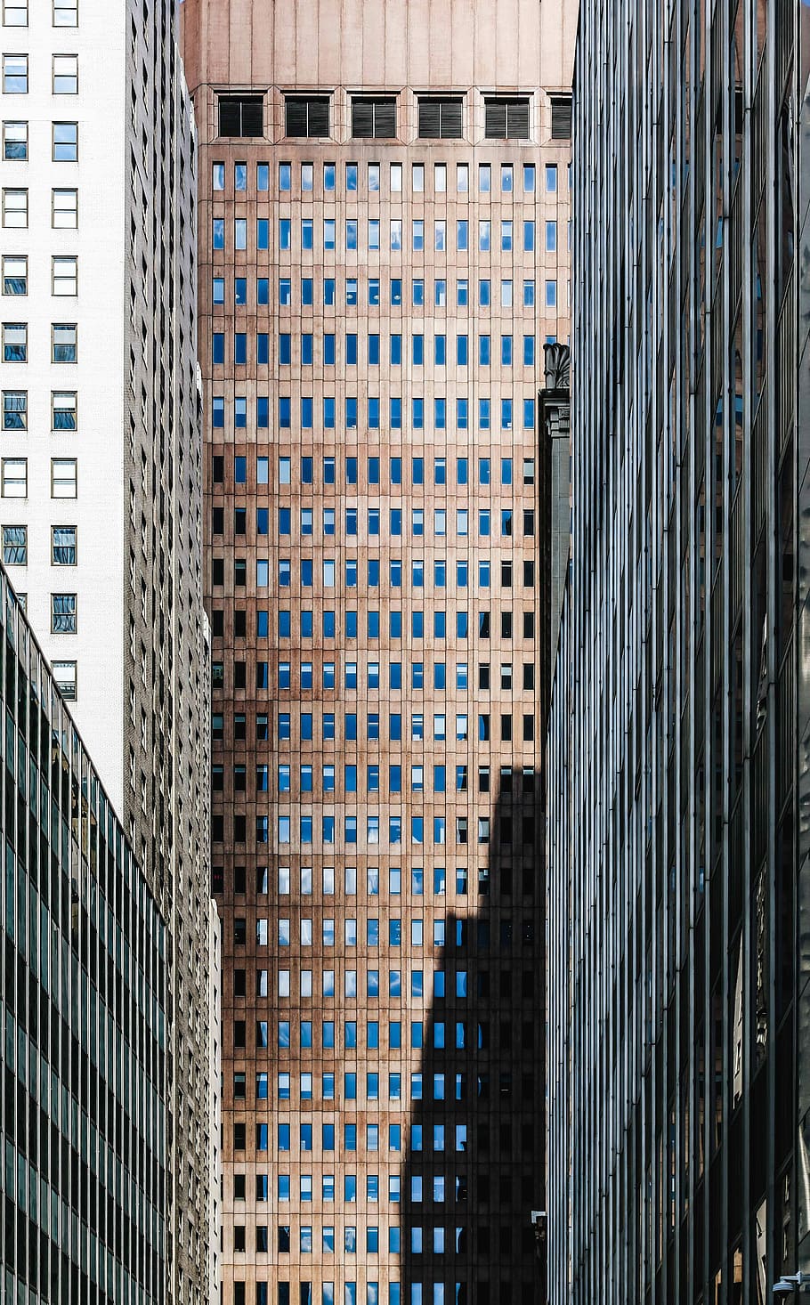 low angle view of brown high-rise building, brown glass building HD wallpaper