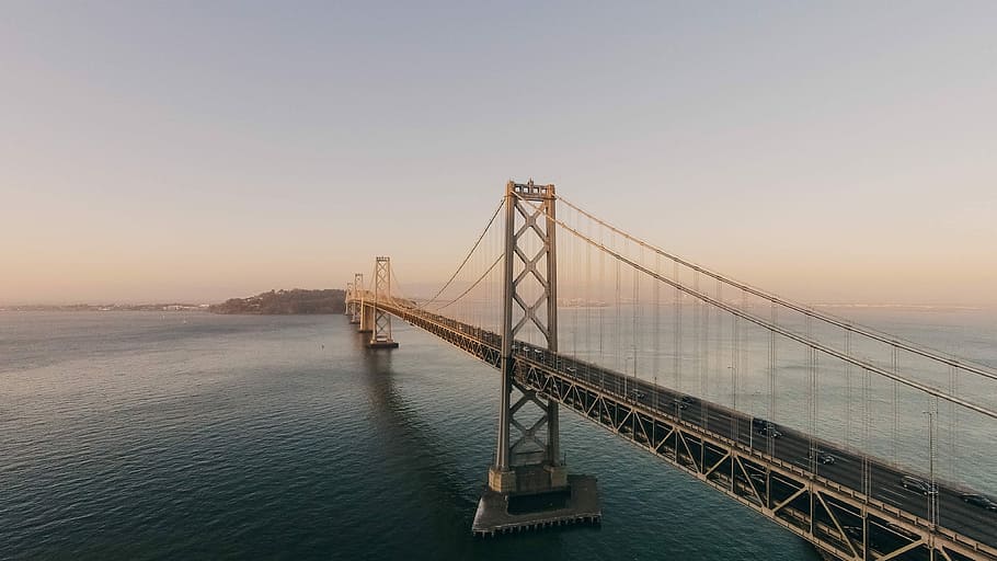 body of water under brown bridge under white sky, golden Gate Bridge HD wallpaper