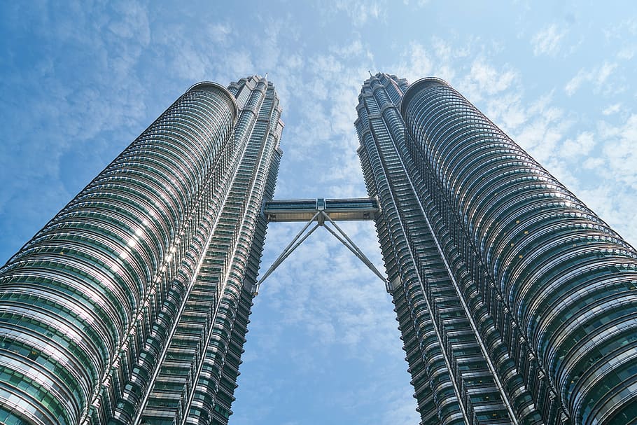 low angle photo of Petronas Tower, Malaysia under blue sky HD wallpaper
