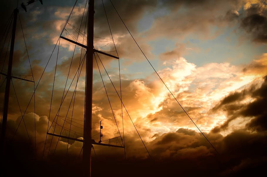 boat on body of water during golden hour, silhouette of electric post during golden hour HD wallpaper