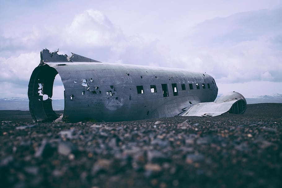 gray wrecked airliner on ground, airplane, wreckage, damaged