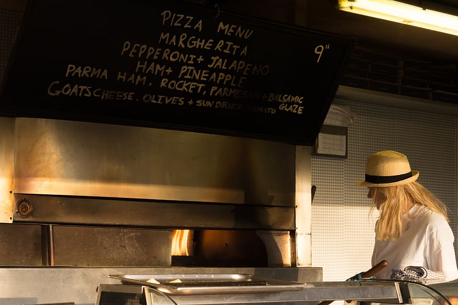 woman wearing fedora hat in front of pizza oven, pizza shop, restaurant, HD wallpaper
