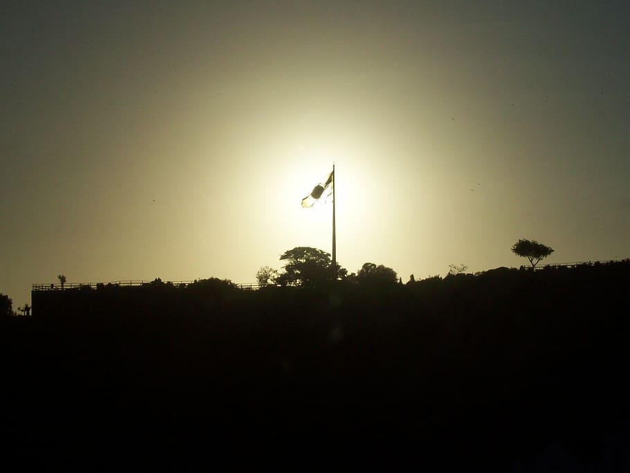 sol, flag, hill, sunset, silhouette, nature, sky, plant, tree HD wallpaper