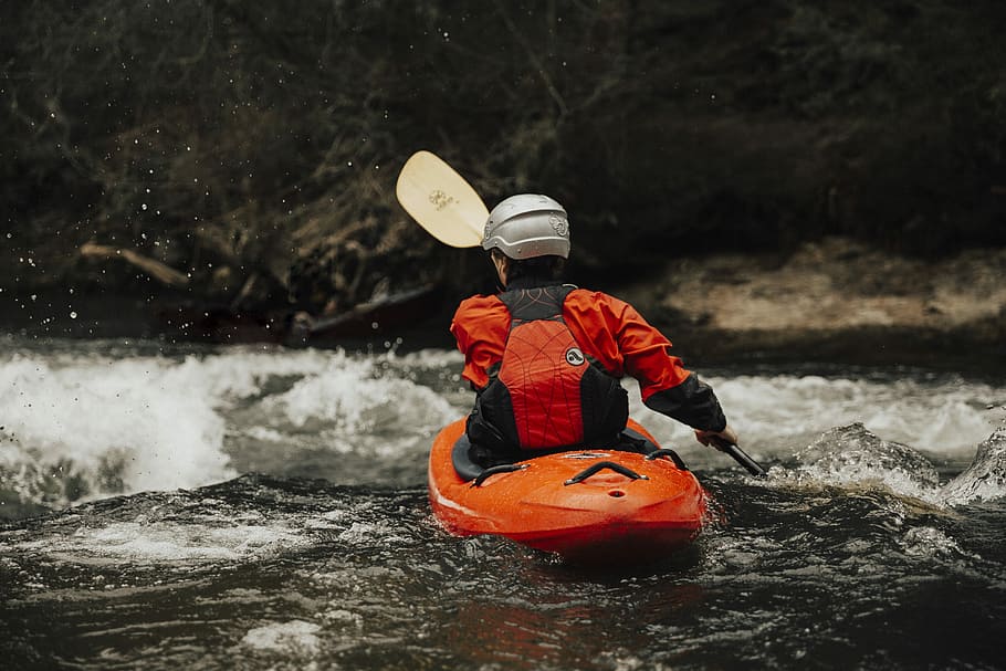person water rafting on body of water, man wearing gray helmet kayaking on flowing stream HD wallpaper