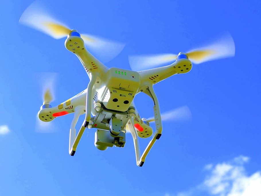 flying drone on sky, quadcopter, quadrocopter, flying machine HD wallpaper