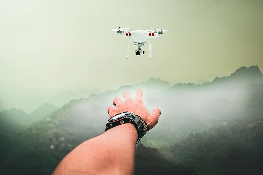 red DJI Phantom drone, hand, willy, mountains, people, desktop HD wallpaper