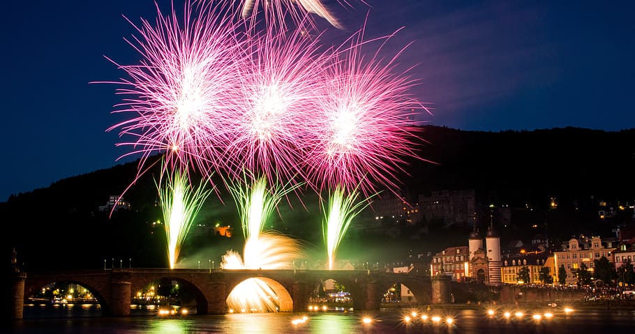 pink and green fireworks, heidelberg, neckar, old bridge, river