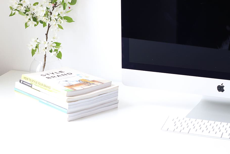assorted book near iMac, white book on white table top, Flowers HD wallpaper