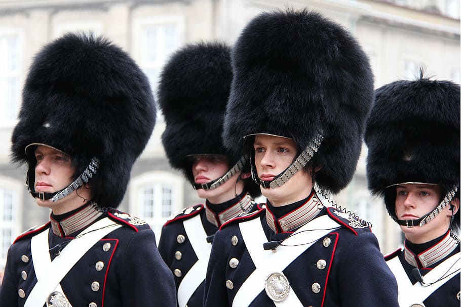 group of soldiers during daytime, marching, royal guard, changing of the guard