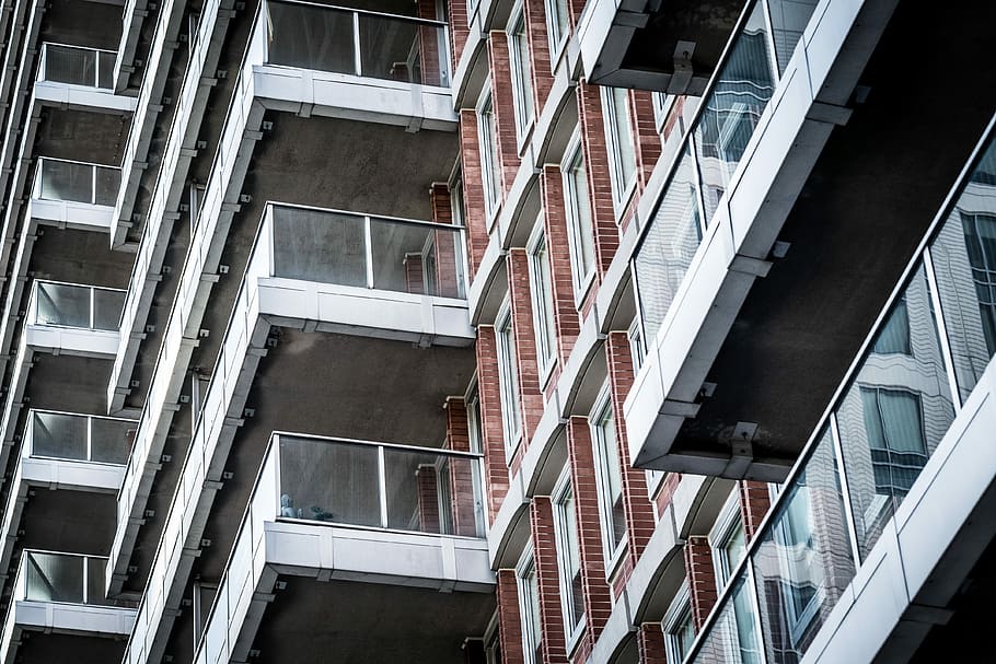 low angle photograph of building, architectural photography of gray and red concrete building HD wallpaper