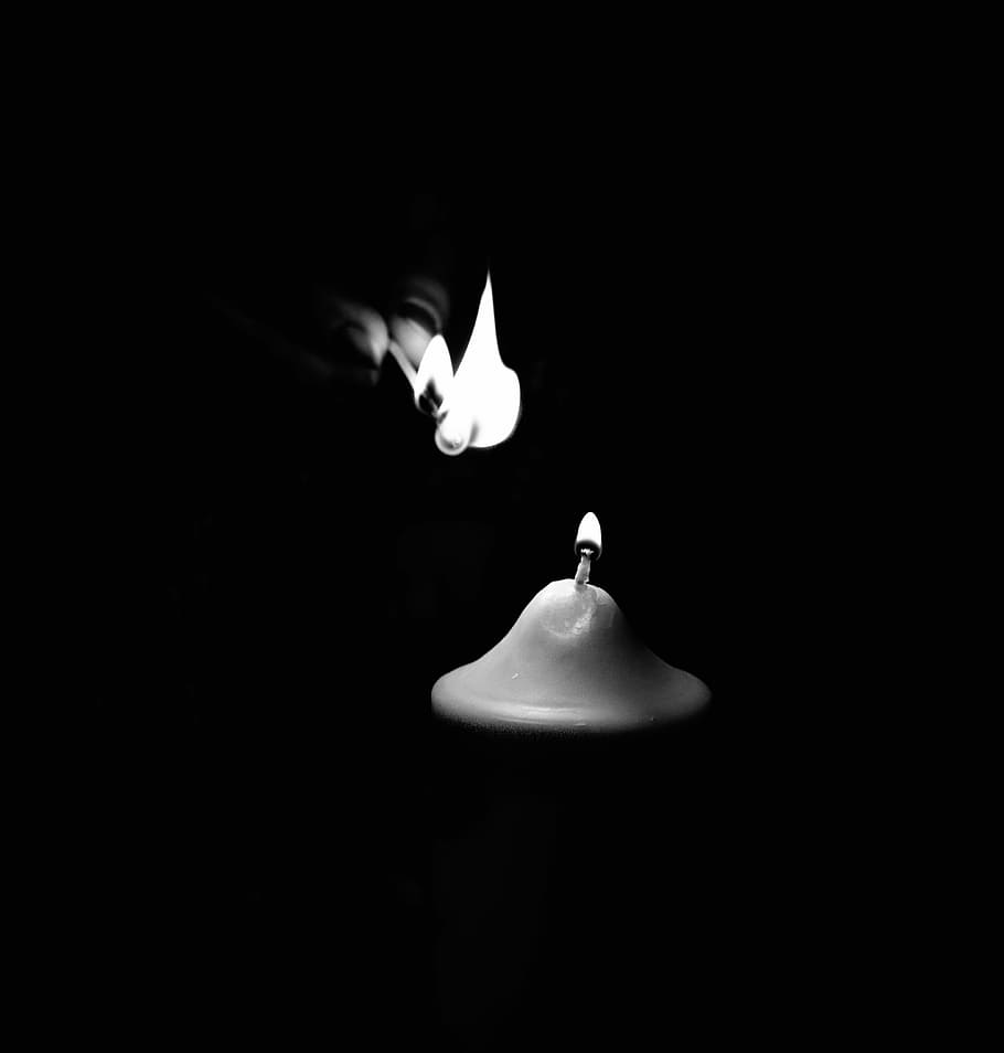 person holding lighter lightning candle, silhouette of person lighting candle HD wallpaper