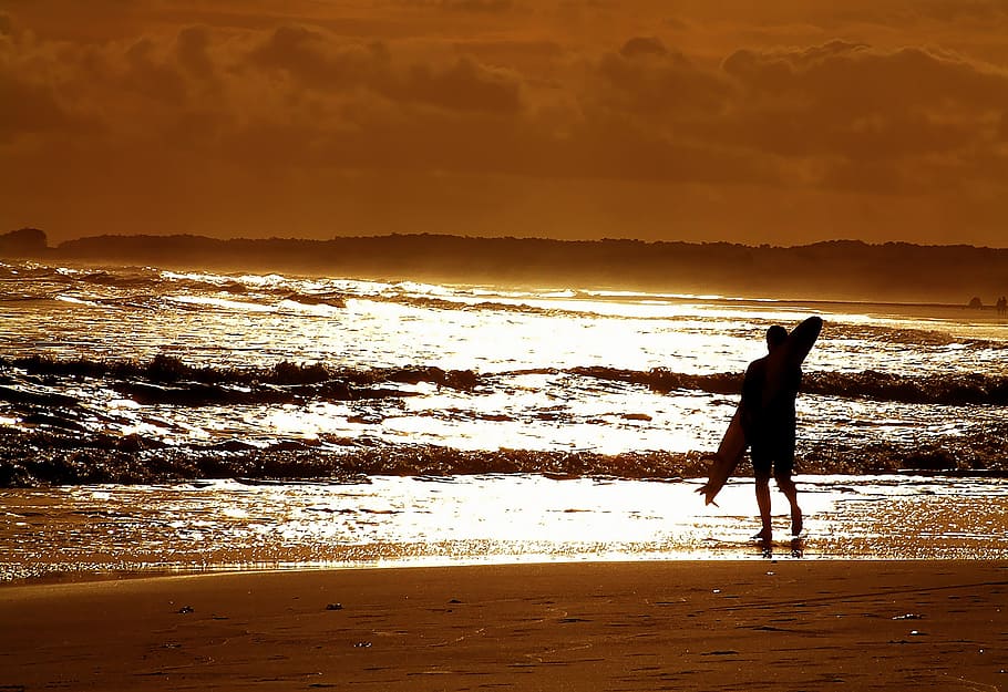 silhouette photography of person with surfboard, Sunset, Sea HD wallpaper