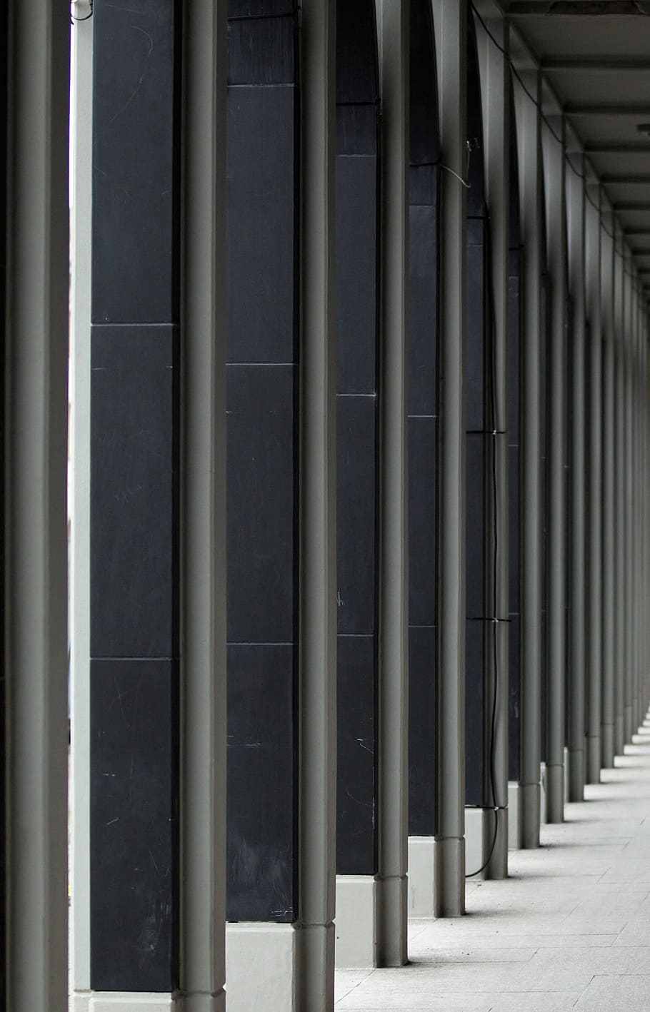 gray metal posts, selective focus photography of concrete posts HD wallpaper
