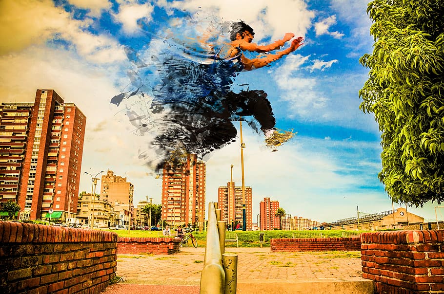 edited photo of man jumping over handrail, disintegration, parkour