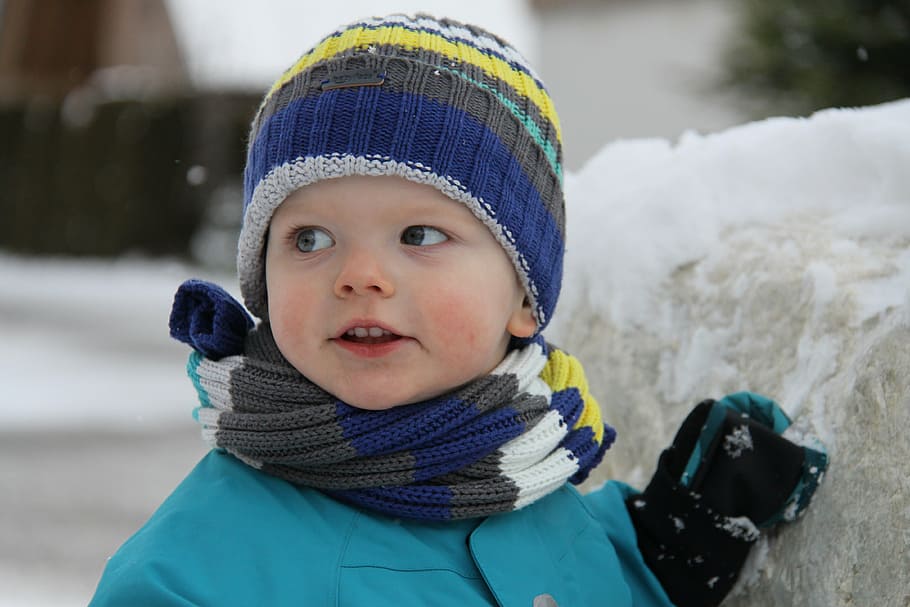 boy standing near gray concrete wall, child, winter, hat, scarf HD wallpaper
