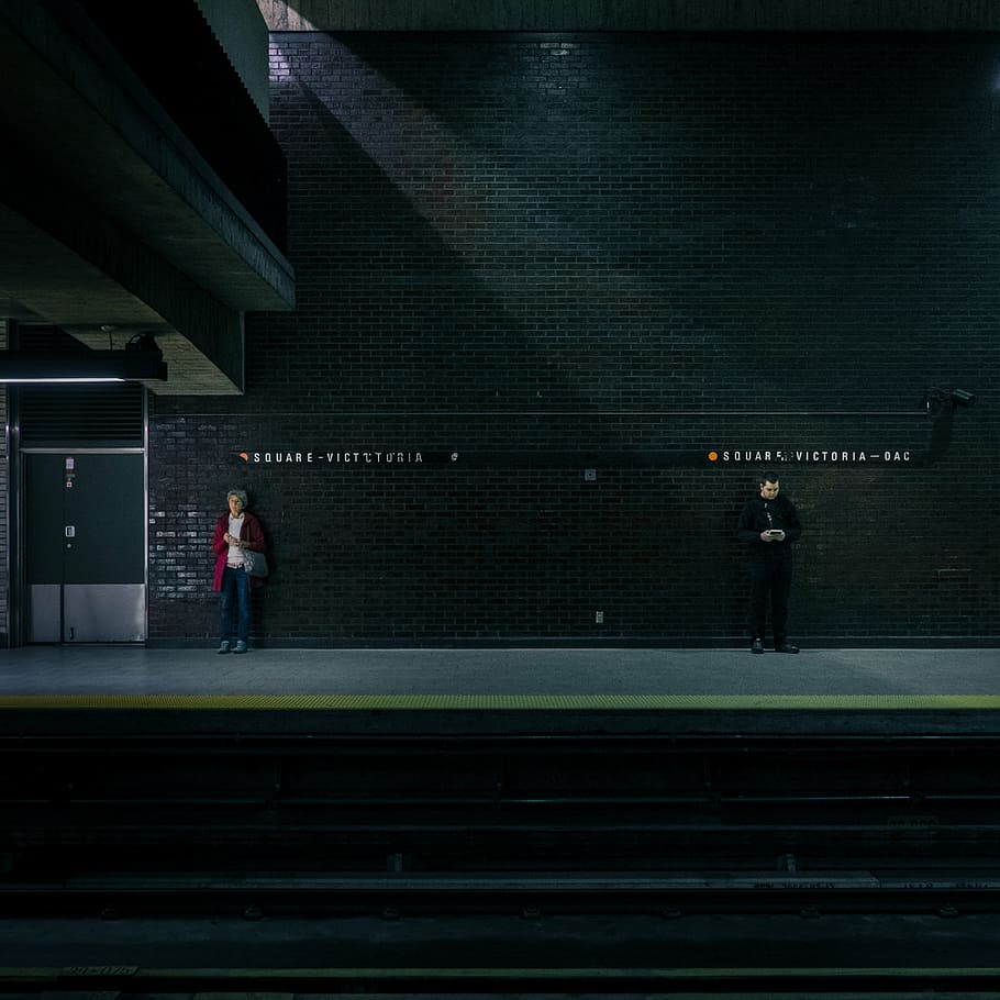two man and woman standing in-front of black building, scene HD wallpaper