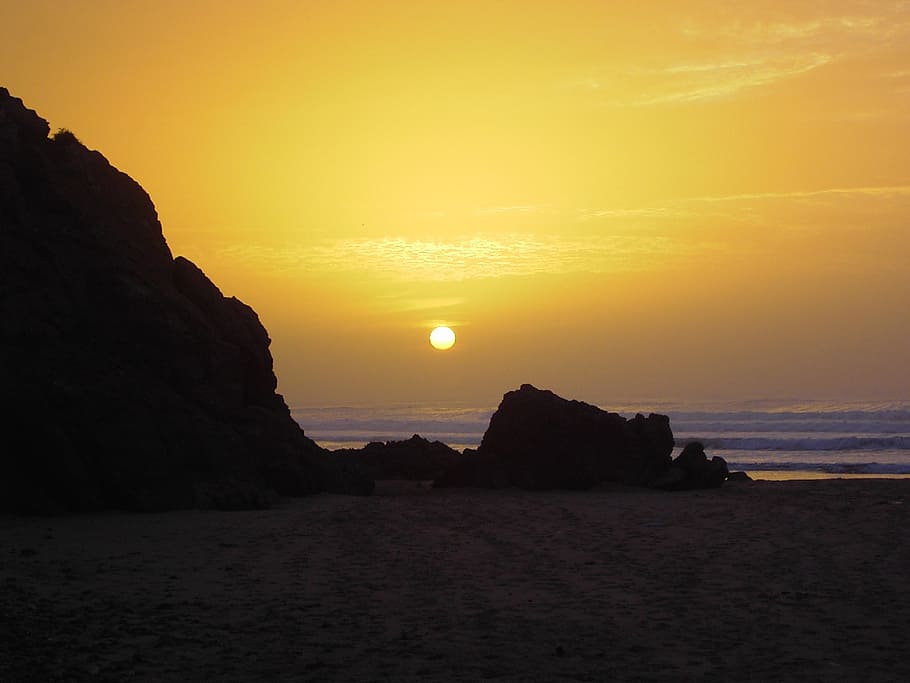 sunset, silhouette, beach, ocean, rocks, dusk, twilight, sunlight HD wallpaper