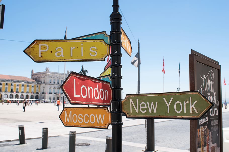 Paris, London,Moscow, and New York signage, close up photography