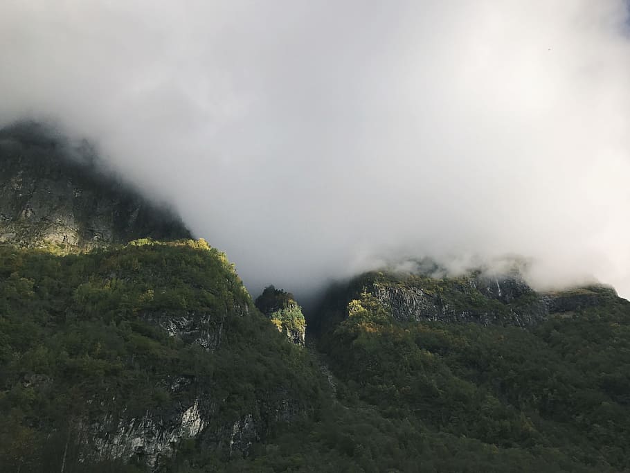 green mountain under cloudy sky, aerial view of mountain and fog HD wallpaper