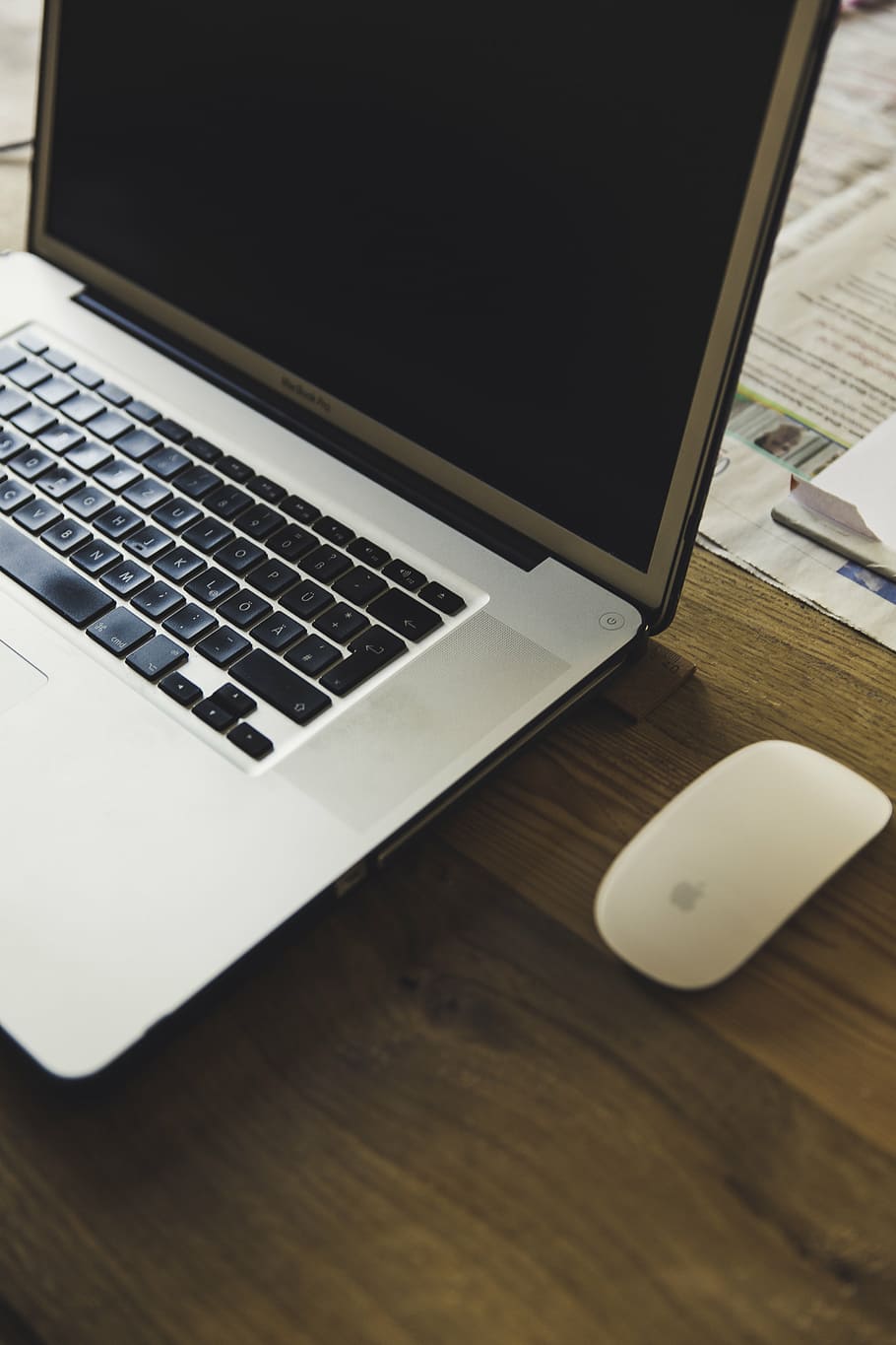 white MacBook Pro near mouse on table, magic, beside, wooden HD wallpaper