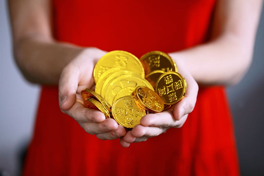 person holding gold-colored ching coins, person holding gold-colored coins, HD wallpaper