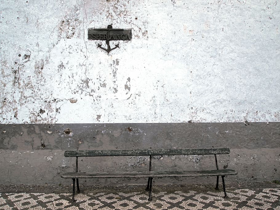 empty brown bench beside white and gray wall, behind, concrete HD wallpaper
