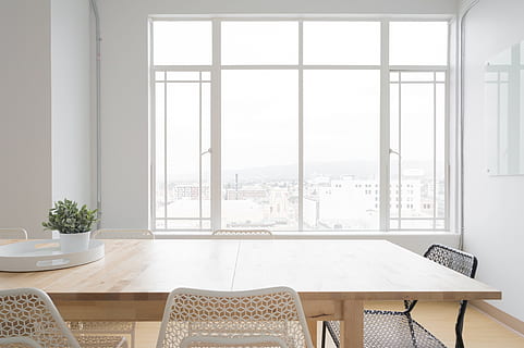 rectangular beige dining table across white window frame, room HD wallpaper