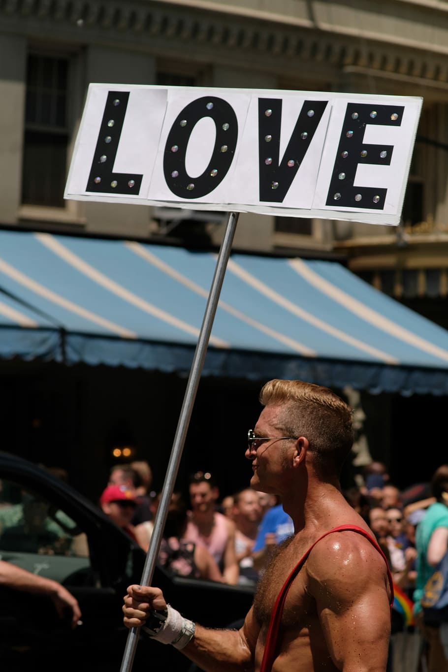 man holding love banner, man holding love signage, march, nyc, HD wallpaper