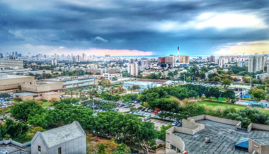 Skyline of the Cityscape with storm brewing in Tel-Aviv, Israel HD wallpaper