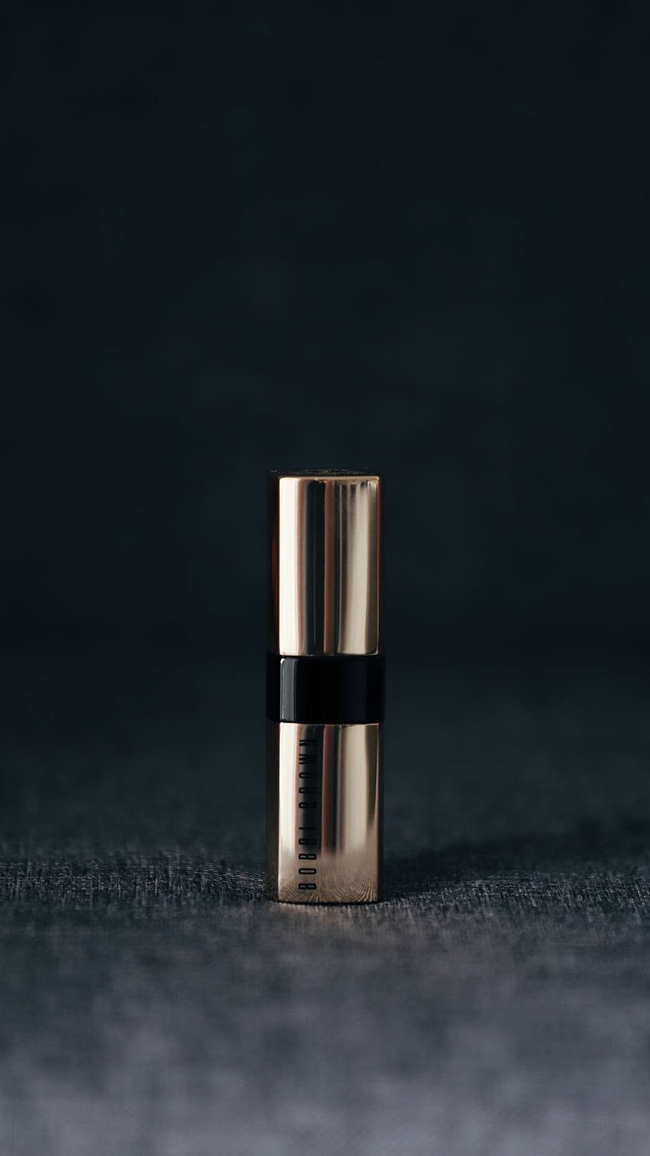 grey lipstick container in selective focus photography, shallow focus photography of perfume bottle HD wallpaper