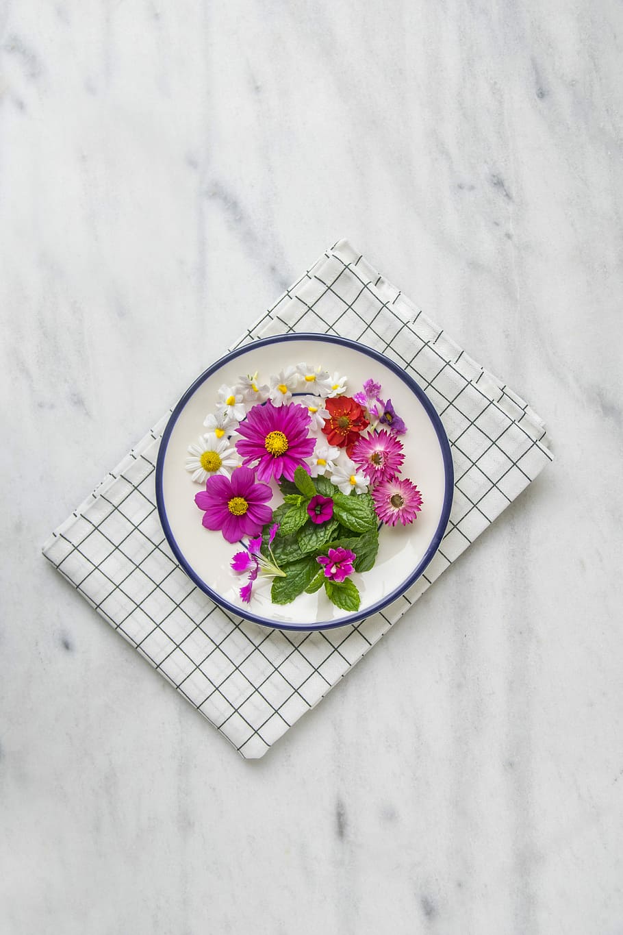 pink petaled flower on white plate, assorted flowers on plate HD wallpaper