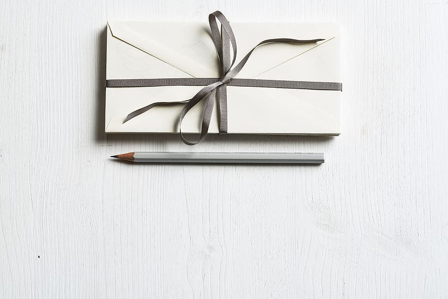 white envelop and gray pencil on white panel, gray pencil, top HD wallpaper