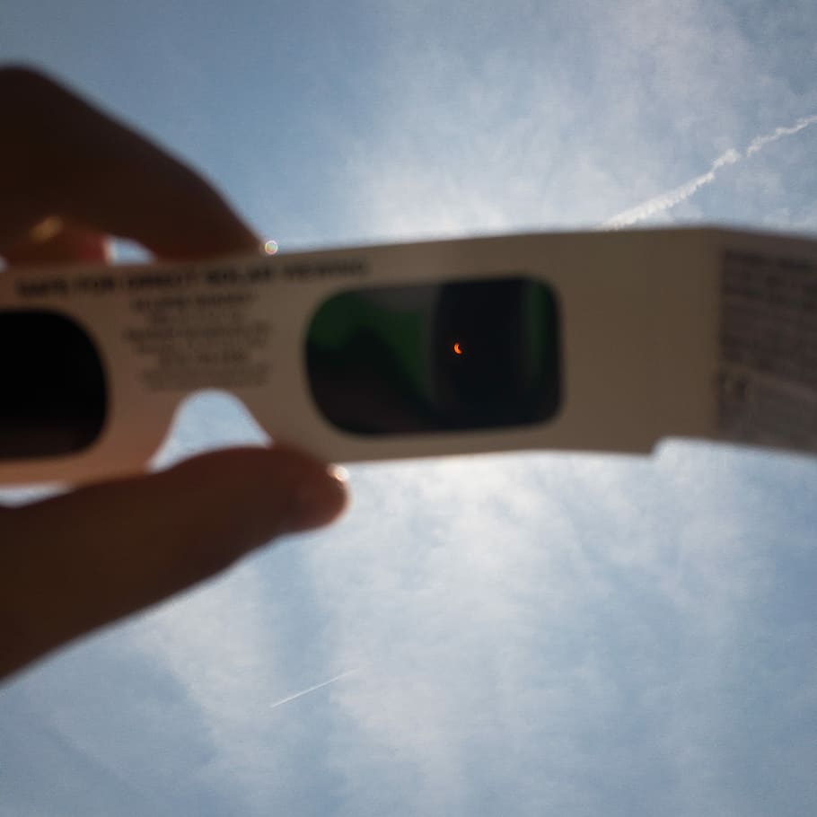 person's hand holding white 3D sunglasses, person holding 3D glasses HD wallpaper